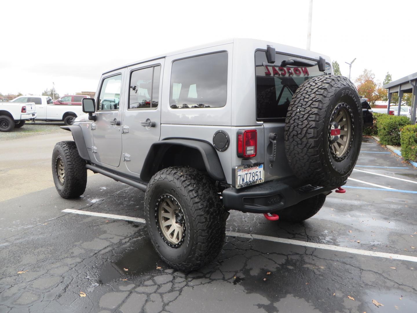 2017 SILVER /BLACK Jeep Wrangler Unlimited Rubicon 4WD (1C4BJWFG3HL) with an 3.6L V6 DOHC 24V FFV engine, automatic transmission, located at 2630 Grass Valley Highway, Auburn, CA, 95603, (530) 508-5100, 38.937893, -121.095482 - Rubicon sitting on a Teraflex suspension system, Falcon shocks, 37" BFG KO2 tires, 17" Hardrock wheels, RC Fender Flares, and AMP steps. - Photo#6